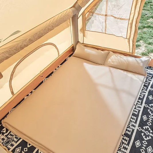 Matelas gonflable 2 personnes dans une tente gonflable